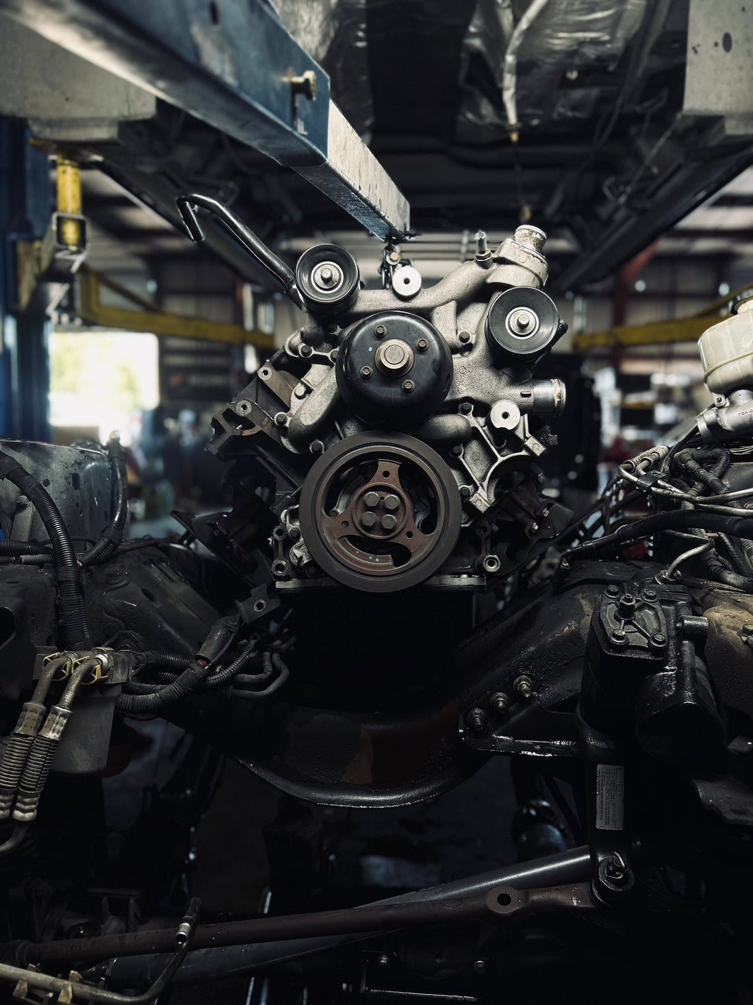 Vintage Ford truck being serviced at a Texas restoration shop.